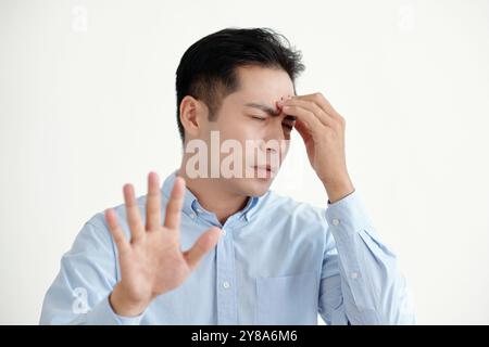 Man Having Headache Above His Problems Stock Photo