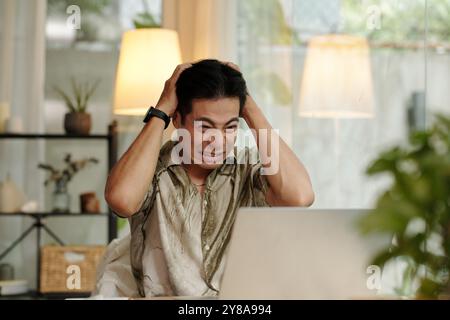Man Having Problems At Work Stock Photo