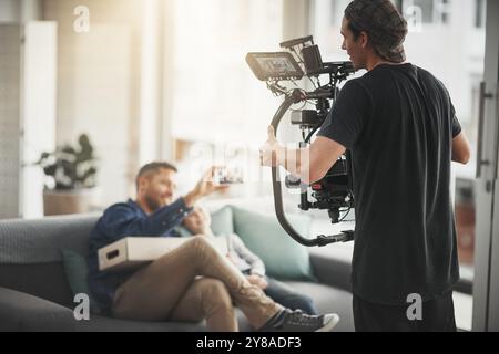 Cameraman Shooting Model In Studio Stock Photo - Alamy