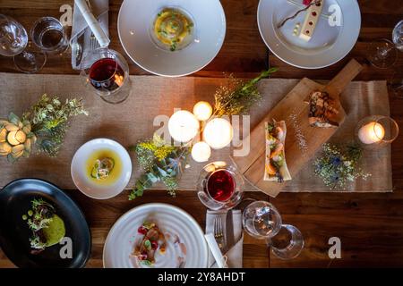 Overhead view of decorative table setting and light fare Stock Photo