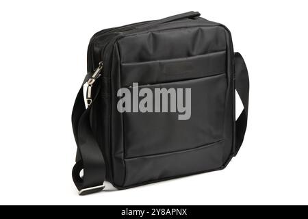 Isolated men's shoulder bag on white. Men's shoulder bag and handbag. Black leather small bag for money, keys, and documents isolated on white. Black Stock Photo