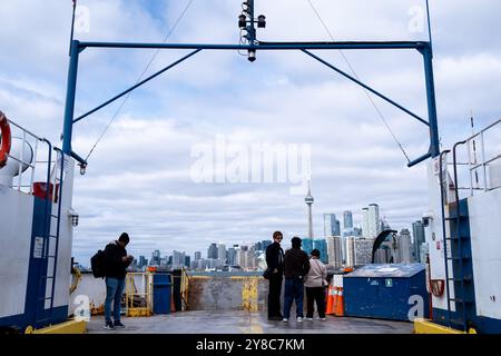 Urban landscape with high-rise residential and office buildings and the CN Tower seen from th ferry boat to Ward s Island in the Toronto Islands archi Stock Photo