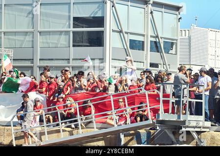 PPL PHOTO AGENCY - COPYRIGHT RESERVED 2024 America's Cup - Barcelona, Spain Final Round Robin LVC race 11: Luna Rossa supporters and families at the dock of the base waiting the return of the lady  PHOTO CREDIT: © Alexander Panzeri/PPL Stock Photo