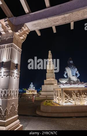 idols of hindu holy sage sitting in mediation at outdoor at night image is taken at mahakaleshwar mahakal temple corridor ujjain madhya pradesh india. Stock Photo