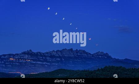 Composition of the different phases of a total lunar eclipse over Montserrat mountain (Barcelona, ​​Catalonia, Spain) Stock Photo