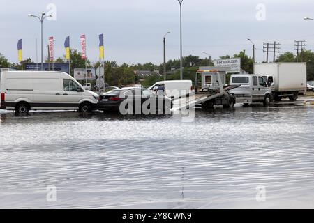 ODESSA, UKRAINE-September 5,2024: After heavy rains, traffic jams formed on roads, cars are doused with water and stall. Cars float in puddles on the Stock Photo