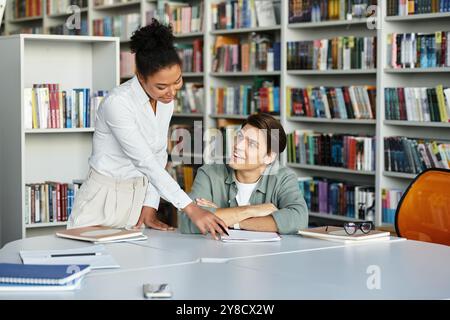 A dedicated teacher guides her student in discovering new concepts with ...