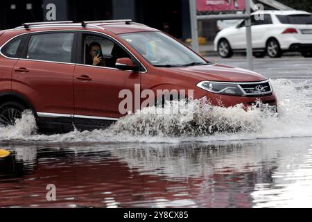 ODESSA, UKRAINE-September 5,2024: After heavy rains, traffic jams formed on roads, cars are doused with water and stall. Cars float in puddles on the Stock Photo