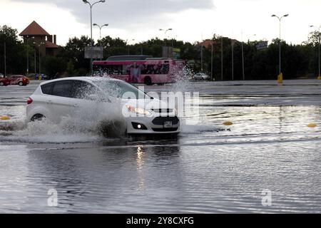 ODESSA, UKRAINE-September 5,2024: After heavy rains, traffic jams formed on roads, cars are doused with water and stall. Cars float in puddles on the Stock Photo