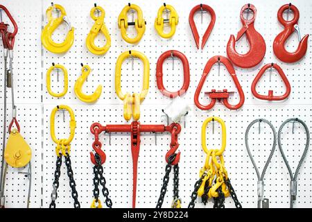 Hooks, blocks, metal cables and chains on exhibition Stock Photo