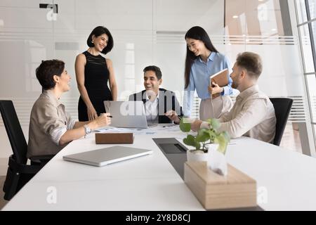 Happy multiethnic business team of entrepreneurs having fun Stock Photo