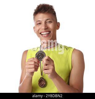 Happy winner with different medals on white background Stock Photo - Alamy