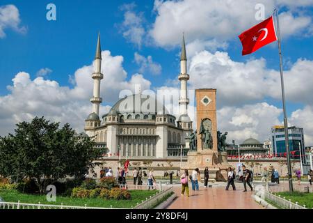 Istanbul, Turkey - September 20, 2024: Taksim Square with the Monument of the Republic sculpted by Pietro Canonica and the Taksim Mosque in Istanbul. Stock Photo