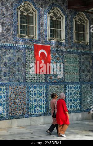 Istanbul, Turkey - September 23, 2024: People visiting the Eyup Sultan Mosque and the mausoleum of Abu Ayyub al-Ansari in Istanbul, Turkey. Stock Photo