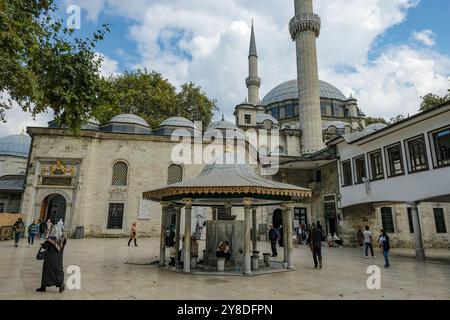 Istanbul, Turkey - September 23, 2024: People visiting the Eyup Sultan Mosque and the mausoleum of Abu Ayyub al-Ansari in Istanbul, Turkey. Stock Photo