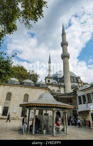 Istanbul, Turkey - September 23, 2024: People visiting the Eyup Sultan Mosque and the mausoleum of Abu Ayyub al-Ansari in Istanbul, Turkey. Stock Photo