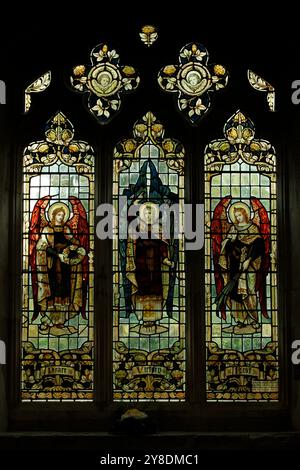 Victorian stained glass window with Peace, Victory and Rest. St John the Baptist, Finchingfield, England, UK Stock Photo