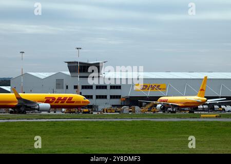 DHL hub at East Midlands Airport. Two DHL cargo planes in attendance. Stock Photo