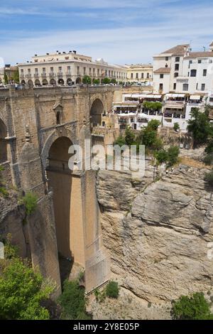 Imposing historic bridge spanning a steep ravine in a Spanish town, El Puente Nuevo, the new bridge, old town, Ronda, Malaga province, Malaga, Andalu Stock Photo