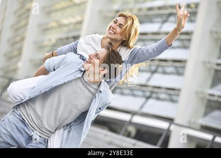 Beautiful couple in love dating outdoors and smiling Stock Photo