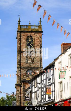 Whitchurch, Shropshire, UK - September 16, 2024; View along Whitchurch High Street with Union Jack bunting to St Alkmunds Church Stock Photo