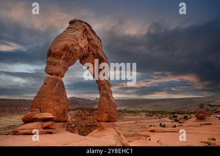 Delicate Arch is a 52-foot-tall (16 m) freestanding natural arch located in Arches National Park, Stock Photo