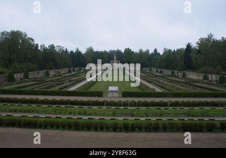 Riga, Lithuania - Sep 13, 2024: Brothers' Cemetery in Riga contains the graves of 2800 latvian soldiers and officers who died in World War II. Cloudy Stock Photo