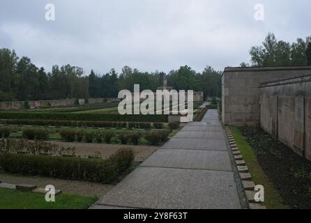 Riga, Lithuania - Sep 13, 2024: Brothers' Cemetery in Riga contains the graves of 2800 latvian soldiers and officers who died in World War II. Cloudy Stock Photo