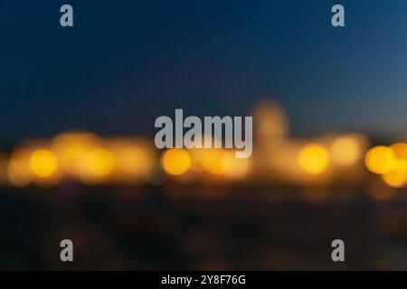 blurred abstract urban background, city lights at night Stock Photo