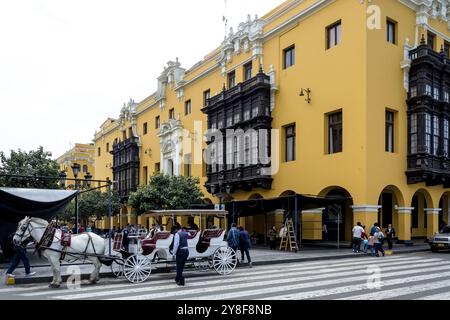 Architectural detail of the historic buildings surrounding Plaza Mayor in the historic center of the city of Lima, capital of Peru. Stock Photo