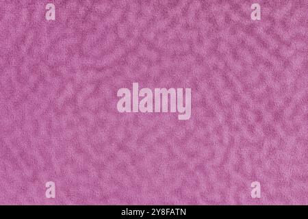 Faux fur, velours pink fabric or cloth with wavy effect. Fluffy fabric texture of artificial fur textile material. Canvas background. Decorative fabri Stock Photo