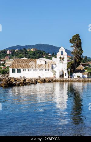 Vlacherna monastery at Mediterranean sea portrait format vacation on Corfu island in Greece Stock Photo