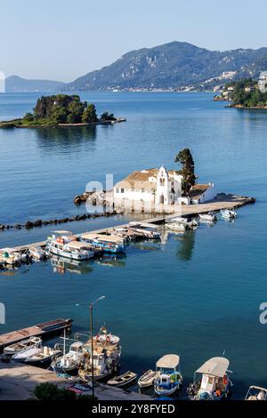 Vlacherna monastery and Mouse Island at Mediterranean sea from above vacation portrait format on Corfu island in Greece Stock Photo