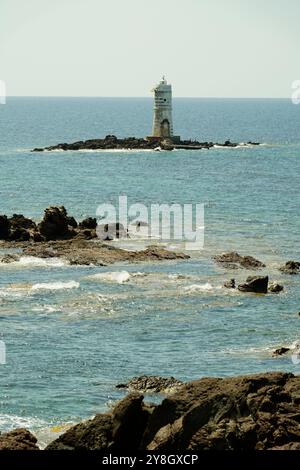 The Faraglioni of Nido dei Passeri, on the coast of Calasetta on the north coast of the island of Sant'Antioco, southern Sardinia, Italy Stock Photo