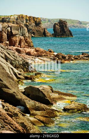 The Faraglioni of Nido dei Passeri, on the coast of Calasetta on the north coast of the island of Sant'Antioco, southern Sardinia, Italy Stock Photo