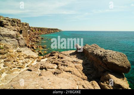 The Faraglioni of Nido dei Passeri, on the coast of Calasetta on the north coast of the island of Sant'Antioco, southern Sardinia, Italy Stock Photo