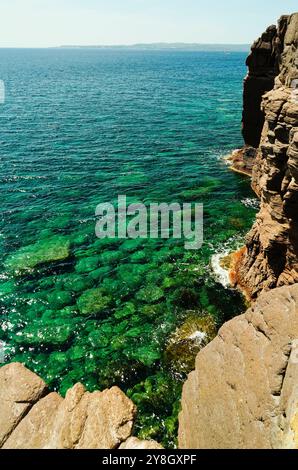 The Faraglioni of Nido dei Passeri, on the coast of Calasetta on the north coast of the island of Sant'Antioco, southern Sardinia, Italy Stock Photo