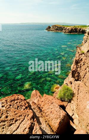 The Faraglioni of Nido dei Passeri, on the coast of Calasetta on the north coast of the island of Sant'Antioco, southern Sardinia, Italy Stock Photo