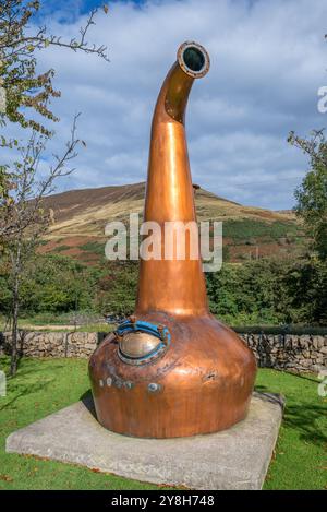 Pot still outside the Lochranza distillery, Lochranza, Isle of Arran, Scotland,  UK Stock Photo