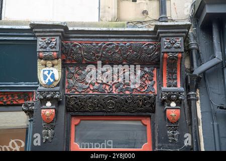 Hexham, Cumberland, England, September 22nd 2024, elaborately styled Victorian artwork on a doorway. Stock Photo