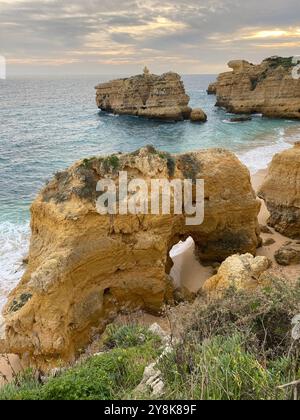 Albufeira, Olhos de Agua, Algarve, Portugal, cliffs and ocean landscape at sunset Stock Photo