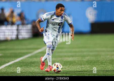 Charlotte, North Carolina, USA. 5th Oct, 2024. CF Montréal midfielder JAHKEELE MARSHALL-RUTTY (11) drives the ball during the first half of the Charlotte FC vs CF Montreal MLS match at Bank of America Stadium in Charlotte, NC on October 5, 2024. (Credit Image: © Cory Knowlton/ZUMA Press Wire) EDITORIAL USAGE ONLY! Not for Commercial USAGE! Stock Photo