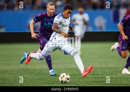 Charlotte, North Carolina, USA. 5th Oct, 2024. CF Montréal midfielder JAHKEELE MARSHALL-RUTTY (11) attacks the ball during the first half of the Charlotte FC vs CF Montreal MLS match at Bank of America Stadium in Charlotte, NC on October 5, 2024. (Credit Image: © Cory Knowlton/ZUMA Press Wire) EDITORIAL USAGE ONLY! Not for Commercial USAGE! Stock Photo