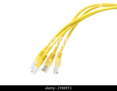 Yellow network cables with molded RJ45 plug isolated on white background Stock Photo