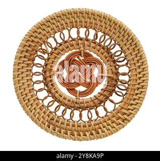 Rounded rattan coaster isolated on white background Stock Photo