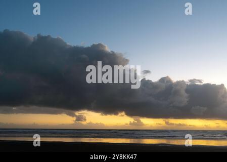 Auckland, New Zealand, Clouds on the horizon moments after sunset Stock Photo