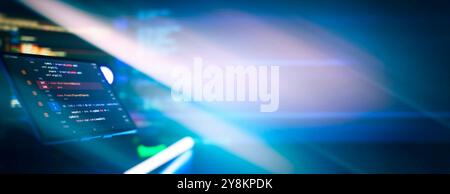 Writing programming code on laptop. Software source code. Programming code. Stock Photo