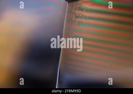 Connection of Green liquid bubbles, oil texture, gasoline in macro Stock Photo