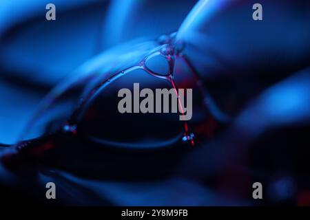 Red and dark blue fluid pattern, fluid background,, dark gloomy background, bubbles connection Stock Photo