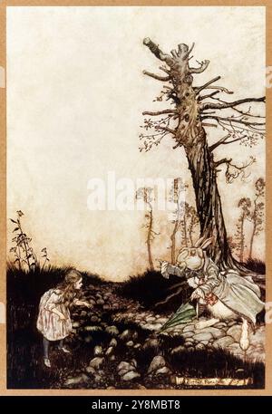 “Why, Mary Ann, what ARE you doing out here?”  illustration from 'Alice's Adventures in Wonderland' by Lewis Carroll (1832-1898), artwork by Arthur Rackham (1867-1939) showing Alice and the White Rabbit who mistakes her for his housemaid.  Photograph from a 1907 first edition featuring Rackham’s illustrations published by William Heinemann, London and Doubleday, Page & Co, New York. Credit: AF Fotografie / Private Collection Stock Photo